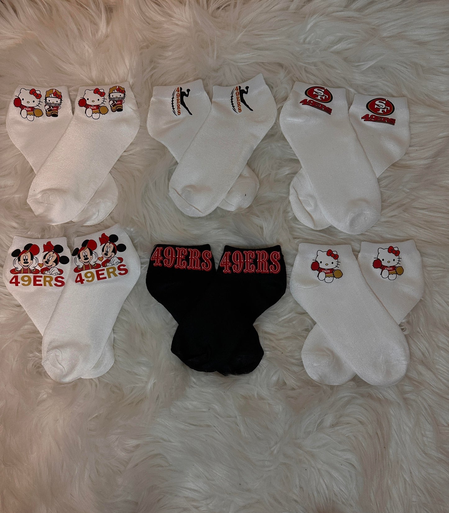 SF 49er and Raider Custom made socks (each sold separately)