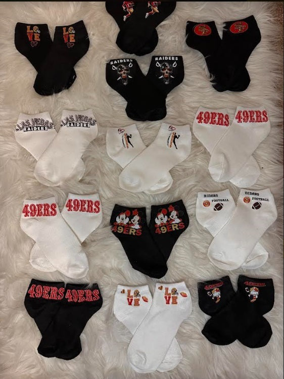 SF 49er and Raider Custom made socks (each sold separately)