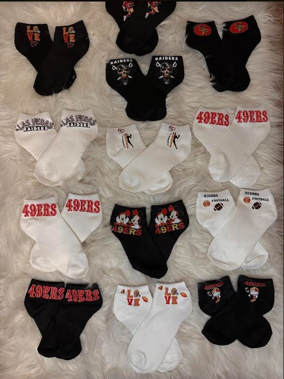 SF 49er and Raider Custom made socks (each sold separately)